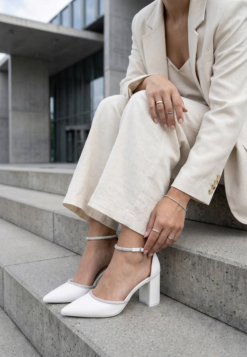 Elegantne cipele na petu Iustina bijele